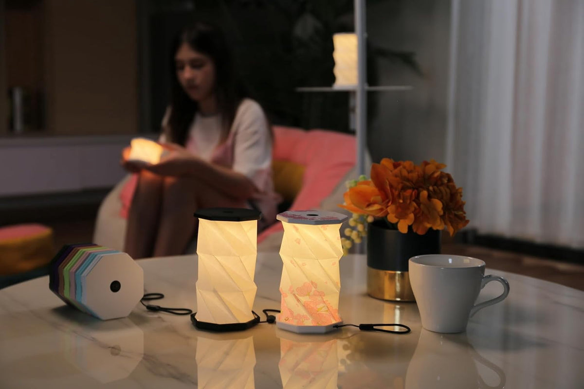 Black Mini Collapsable and rechargable lamp with dimmable light for desk night stand or travel